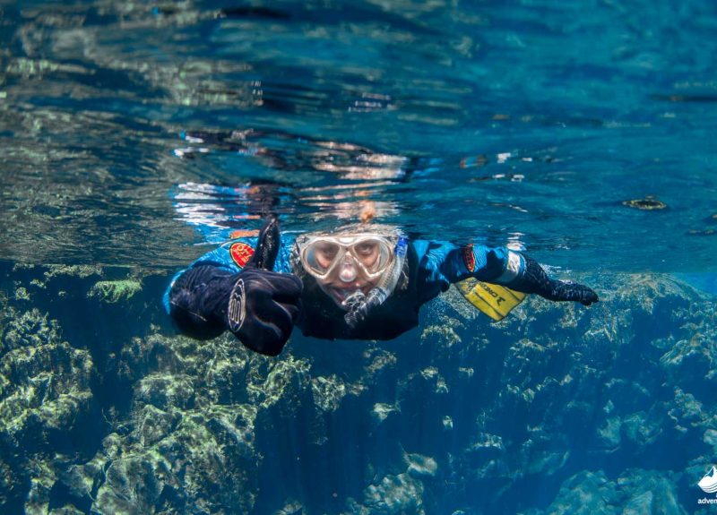 man-snorkeling-in-silfra-fissure-iceland
